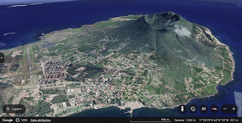Google Earth image of island with volcanic caldera.