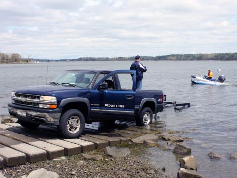 Zego deployed from blue pickup truck at boat landing